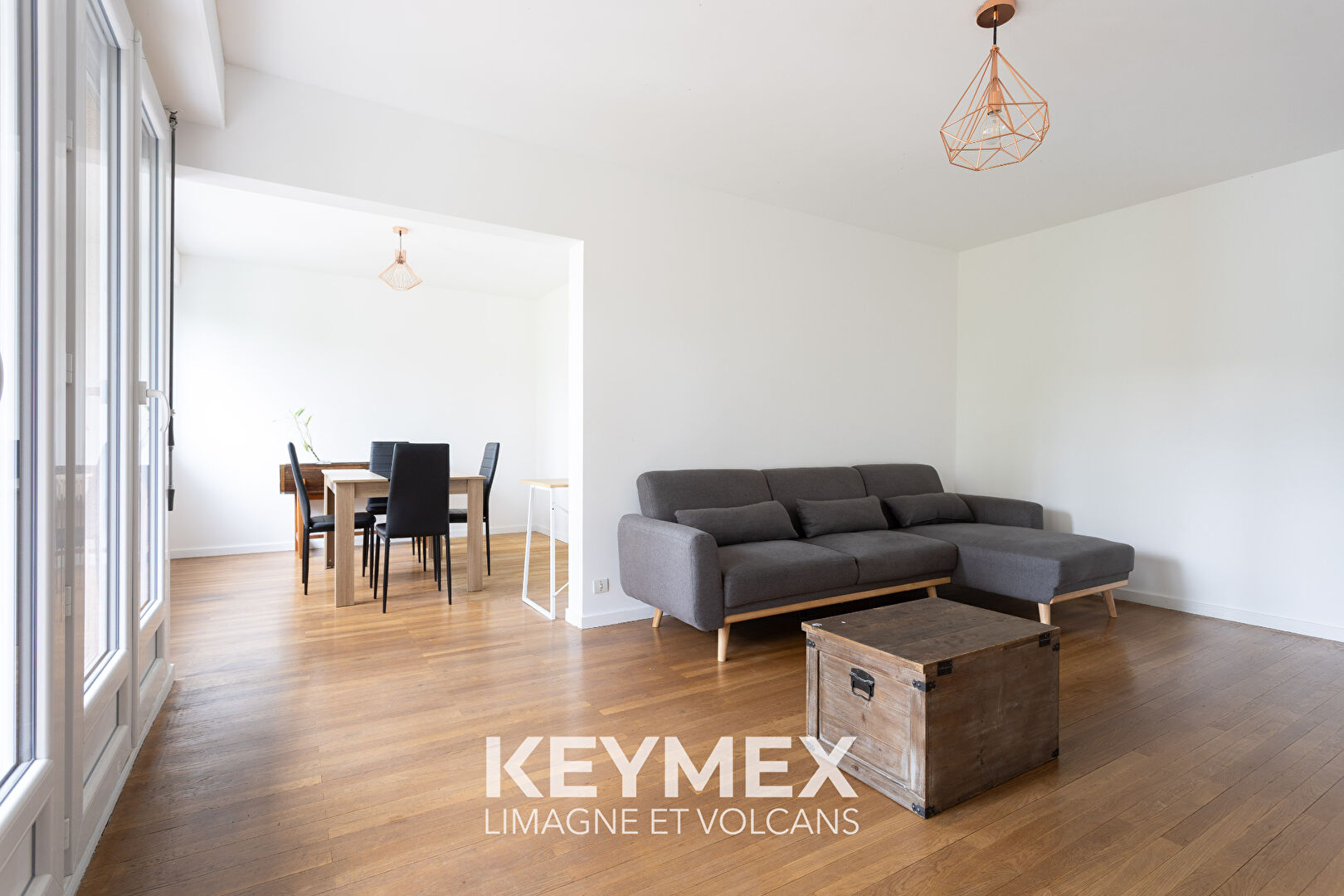 Appartement de type 3 avec balcon, garage et cave.